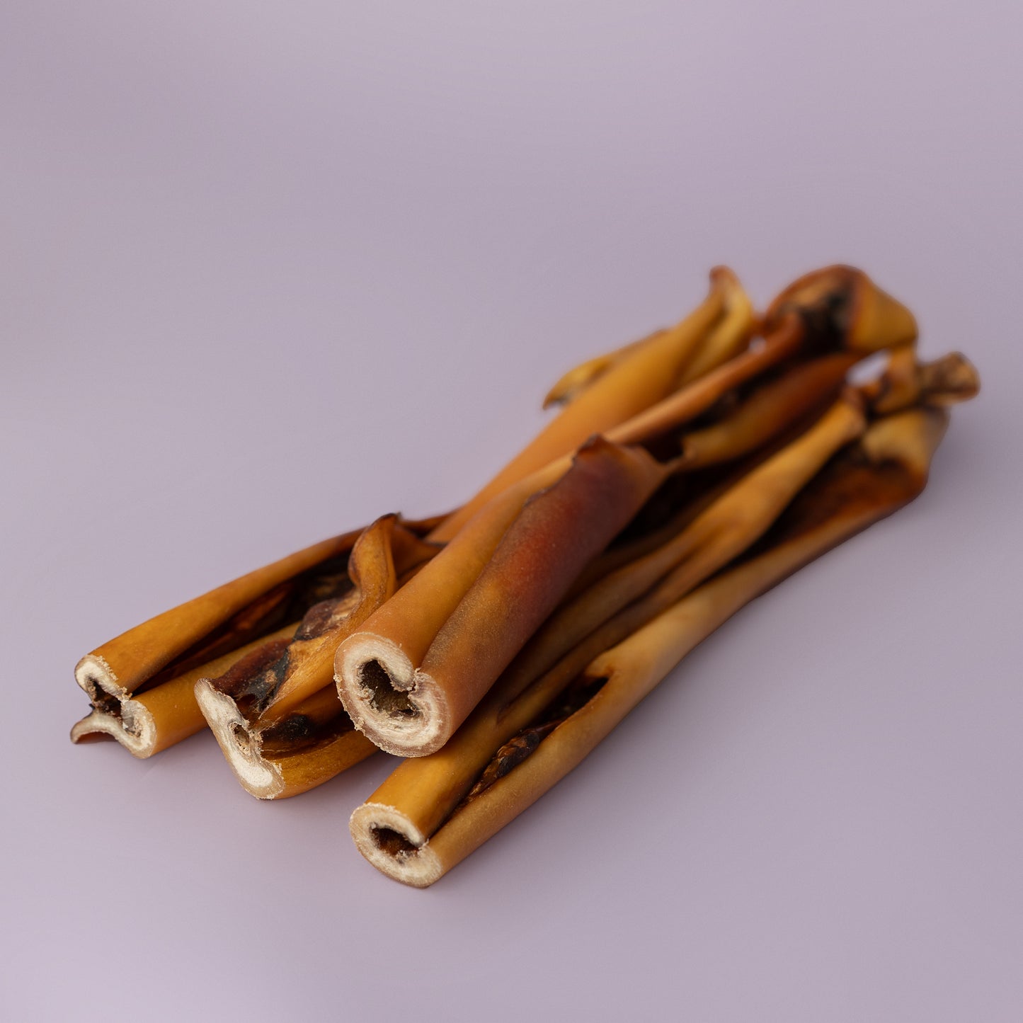 power chew stick for dogs; beef cheek chew; long lasting dog chew; 6 in chew, long-lasting best value dog chew on purple background